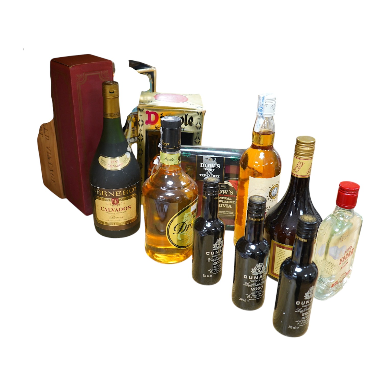 A quantity of various bottles of spirits, port, wine etc., to include Cunard 2000, Dimple Scotch Whiskey and Berneroy Calvados. Condition - fair to good, storage history unknown (13)